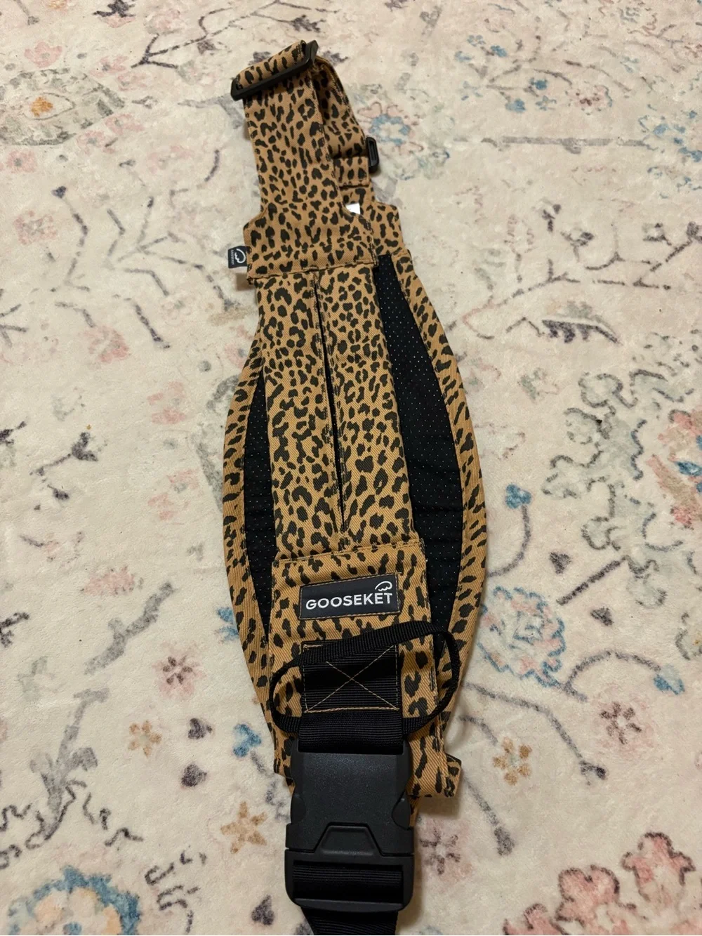 GOOSEKET 365 Toddler Carrier (or hip seat) in a brown leopard print.